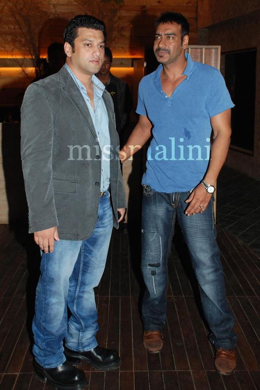 Ali Reza Khan - the owner of the venue - with Ajay Devgan