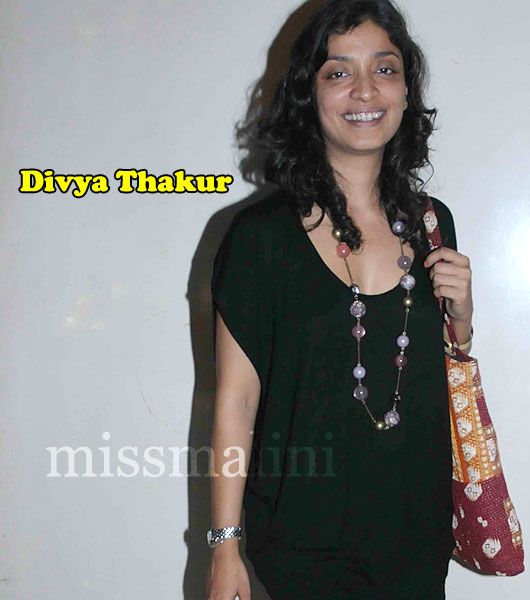 Divya Thakur smiles for the shutterbugs at the launch