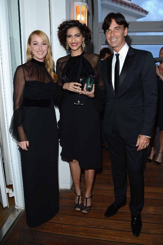 Sonam Kapoor with Frida Giannini, Gucci's Creative Director, and her partner Patrizio di Marco, who also happens to be Gucci's CEO (Photo courtesy | Gucci/Getty Images)