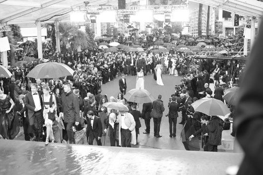 Rain-soaked red carpet on Day 12 of 2012 Cannes Film Festival (Photo courtesy | Vogue Paris)