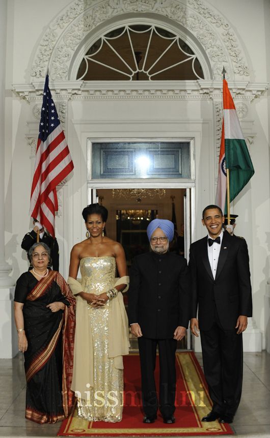 Michelle Obama wears a Naeem Khan gown for a State dinner with Indian Prime Minister Manmohan Singh and his wife