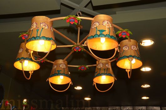 A chandelier made of hand-painted buckets by Rashmi Dogra