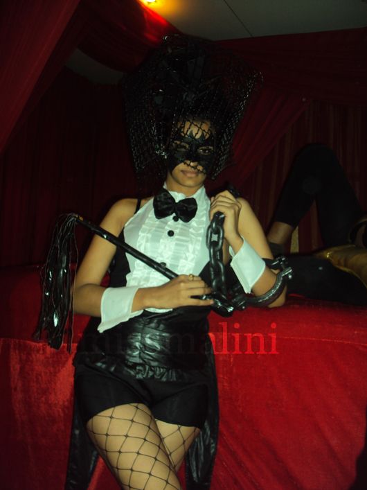 A dominatrix epitomizes the sin, Lust!
