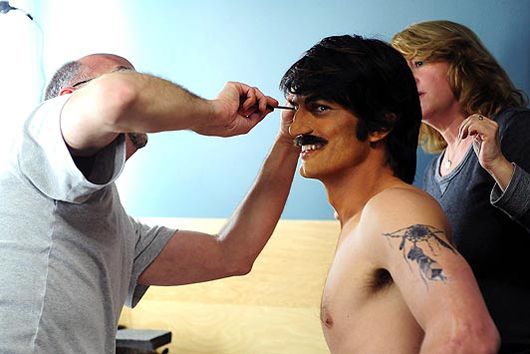 Ashton getting made-up for the role of Raj