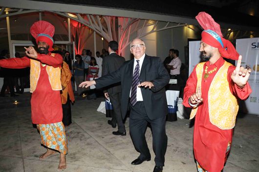 Mr Jean-Luc Margot-Duclot, Senior Vice-President PREDA shakes a leg with the bhangra dancers