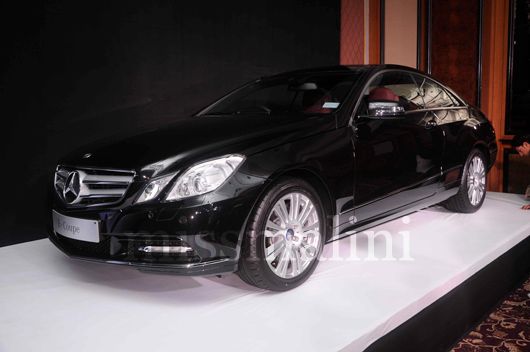 A Mercedes Benz coupe on the ramp