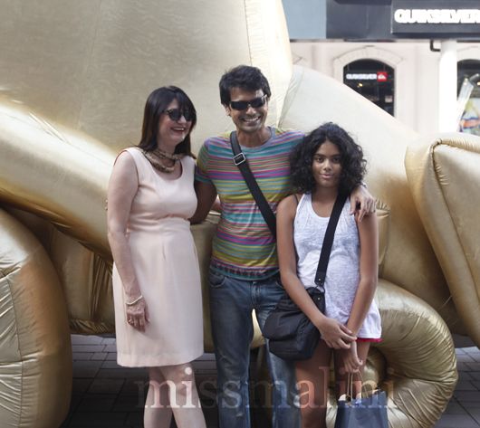 Anna Bredemeyer and Lascelles Symons with his daughter, Shanaya