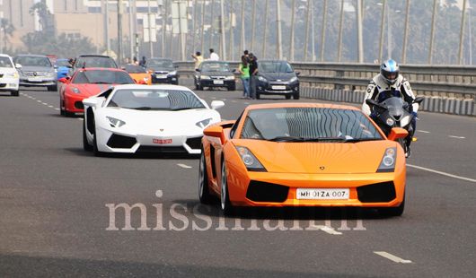 Gautam Singhania on the Sea Link in the lead car of the 4th Parx Super Car Show parade