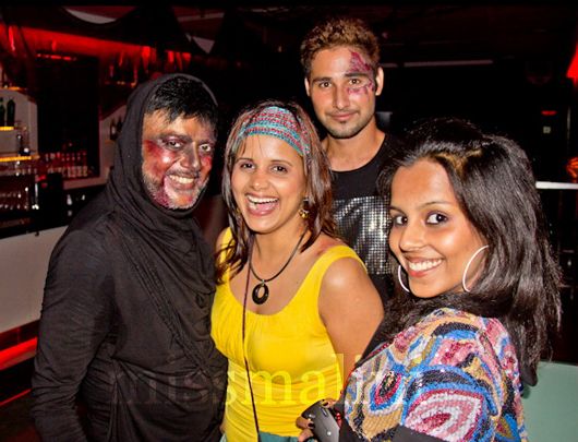 Nisha and Nikki Harale with friends in costume