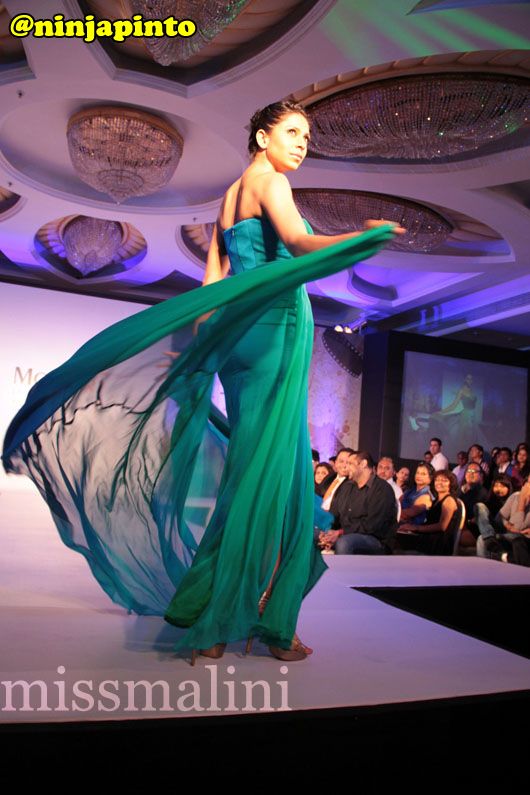 Candice Pinto does a twirl on the catwalk