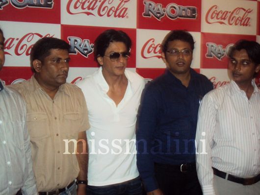 Shah Rukh Khan poses with fans