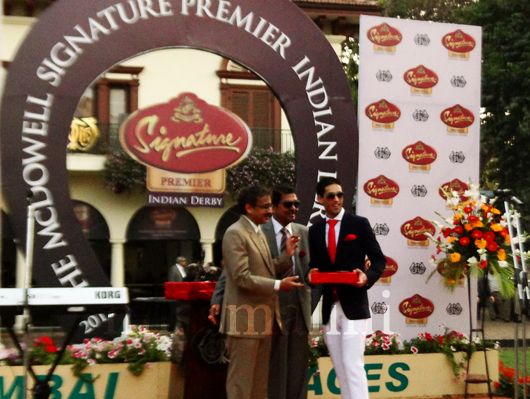 Siddhartha Mallya receives the best dressed man award at the Derby