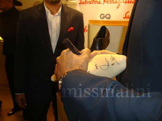 Abhishek Bachchan signs his... er, foot.