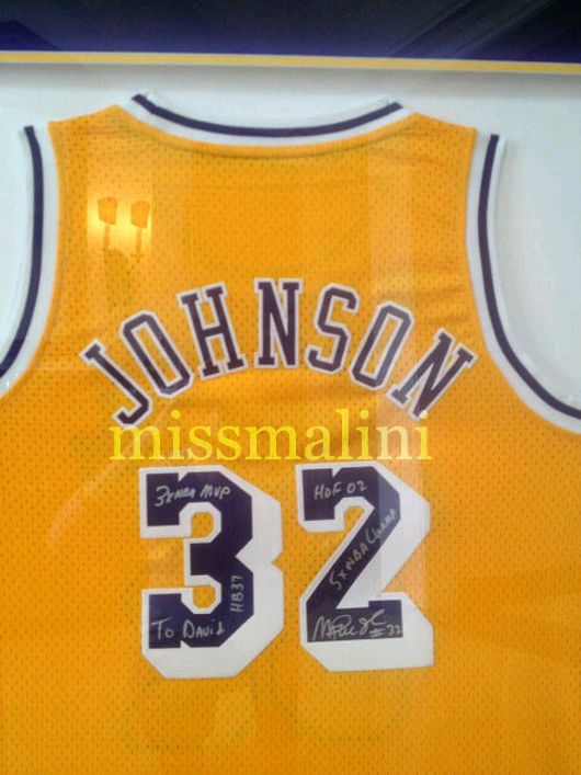 An autographed singlet by Magic Johnson