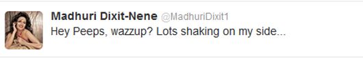 Err....what exactly is Madhuri shaking?