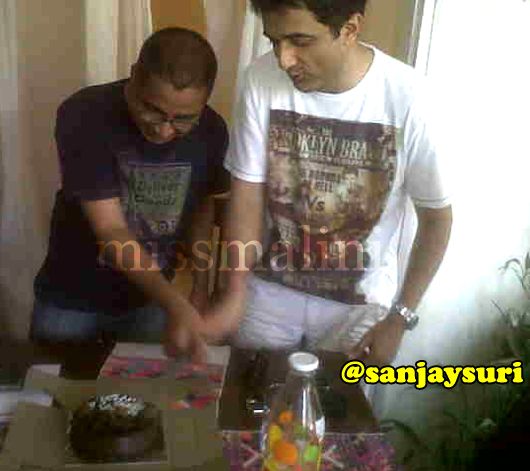 Sanjay Suri cuts his cake with friend, Bikas