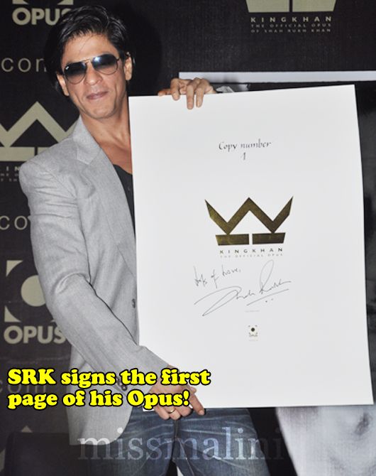 Shah Rukh Khan with the signed first page of his Opus!