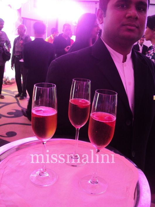 Adding to the pink theme were flutes of pink champagne with a strawberry bobbing inside