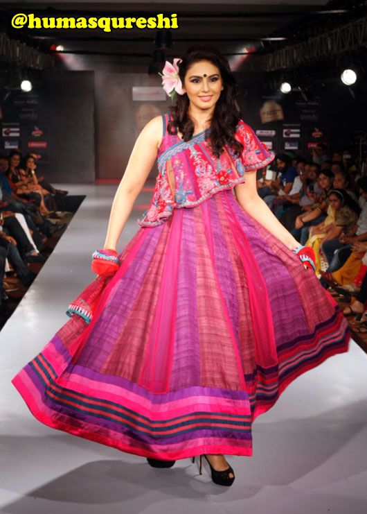Huma Qureshi walking the ramp wearing designer duo Mona Pali's outfit
