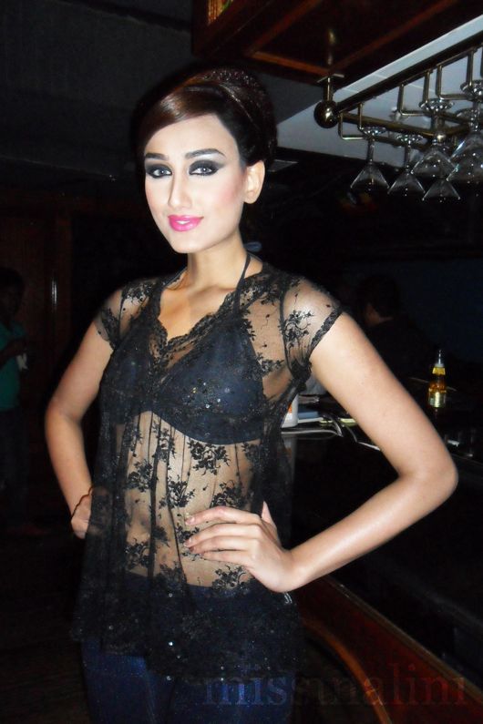 A model in a Rehan Shah outfit