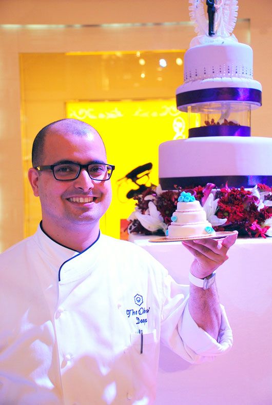 Chef Deep Bajaj from the Oberoi Patisserie with one of his creations