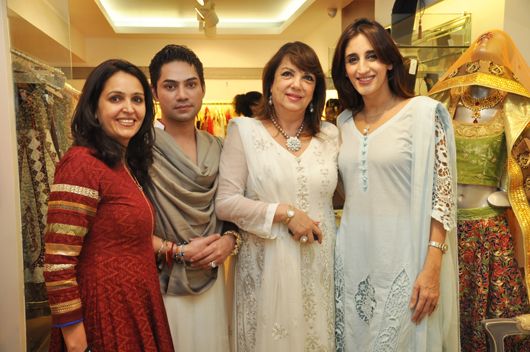 The designers with Zarine and Farah Khan