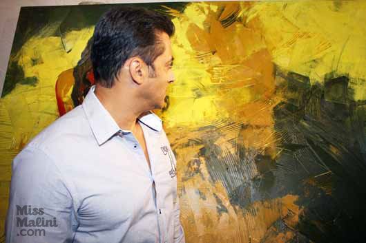 Salman checks out a painting by Rouble