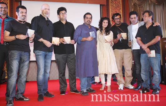 The cast and crew unveil a CD of the film's music