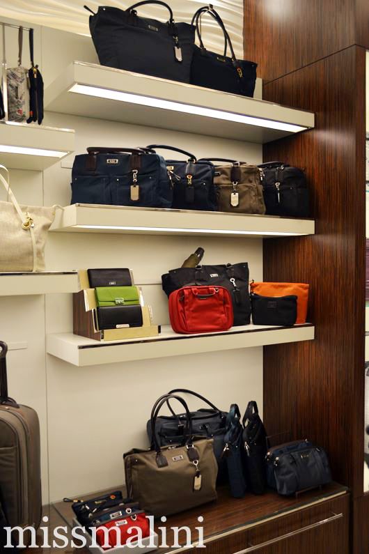 Tumi bags on display