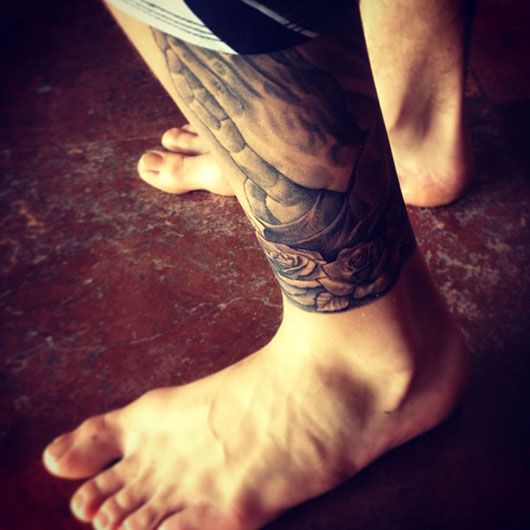 Justin Bieber praying hands & roses tattoo (photo courtesy Instagram)