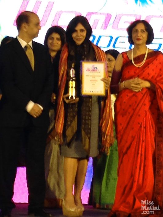 Nisha JamVwal receiving the award for Women Achievers