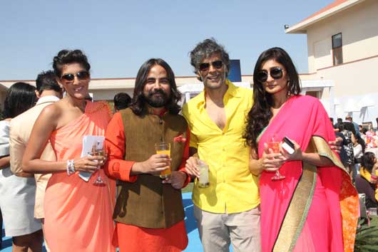 Ambika Anand, Sabyasachi Mukherjee and Milind Soman with a friend