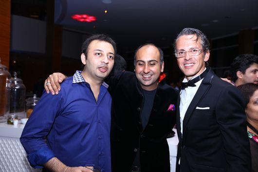 Owner of Park Hyatt Chennai Amit Mahtaney (center) and Yann Gillet (right) with a friend