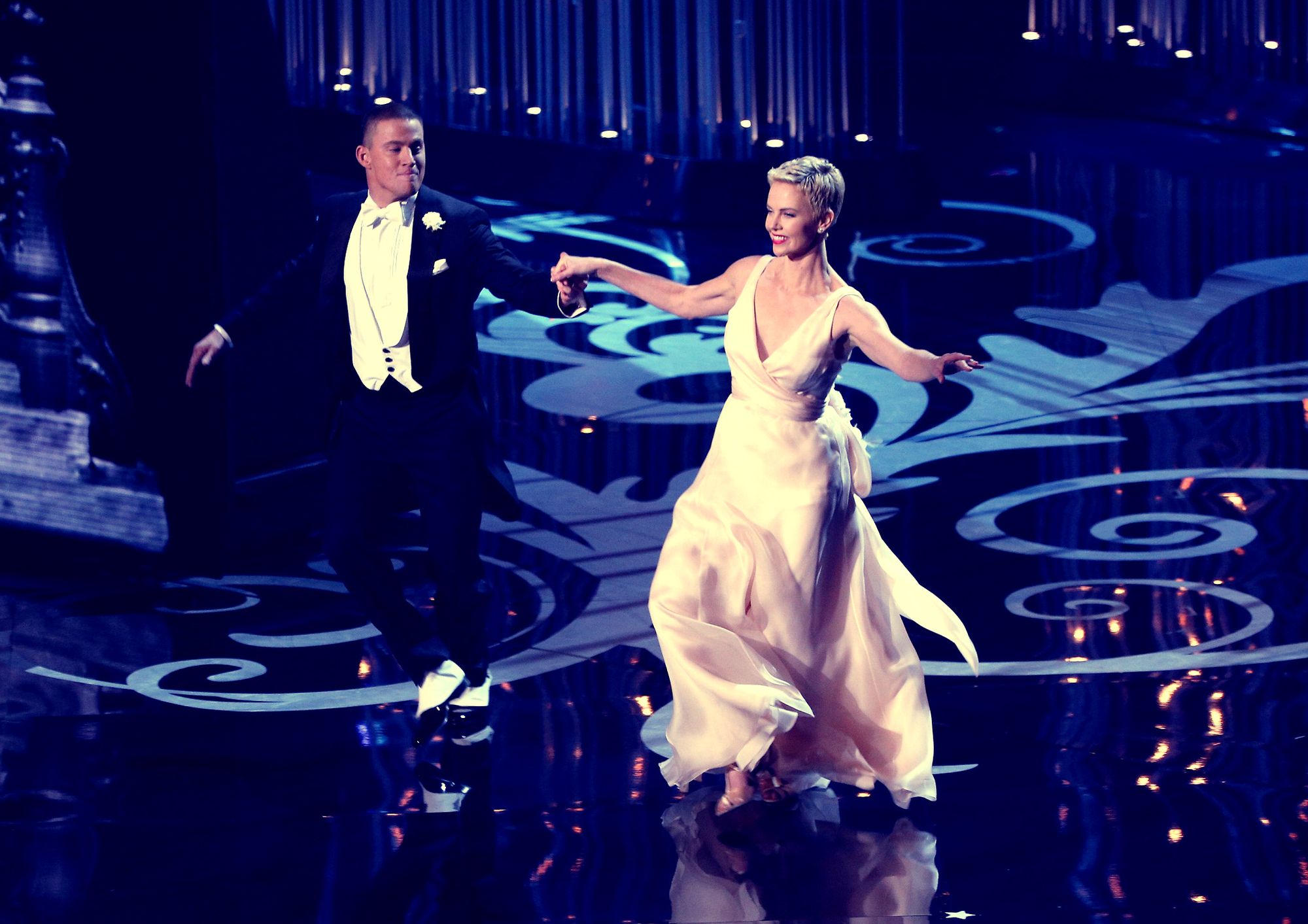 Channing Tatum (in Gucci) & Charlize Theron performing at the 85th Annual Academy Awards (Photo courtesy | Gucci/Getty Images)