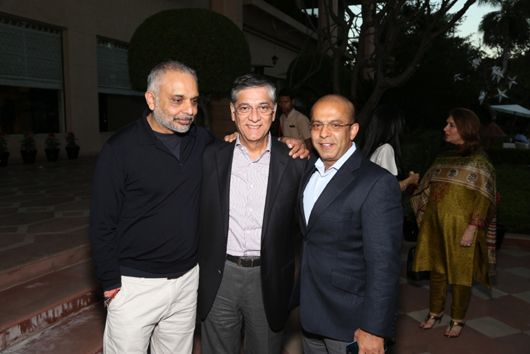 Hari Bhartia and Atul Punj with a friend