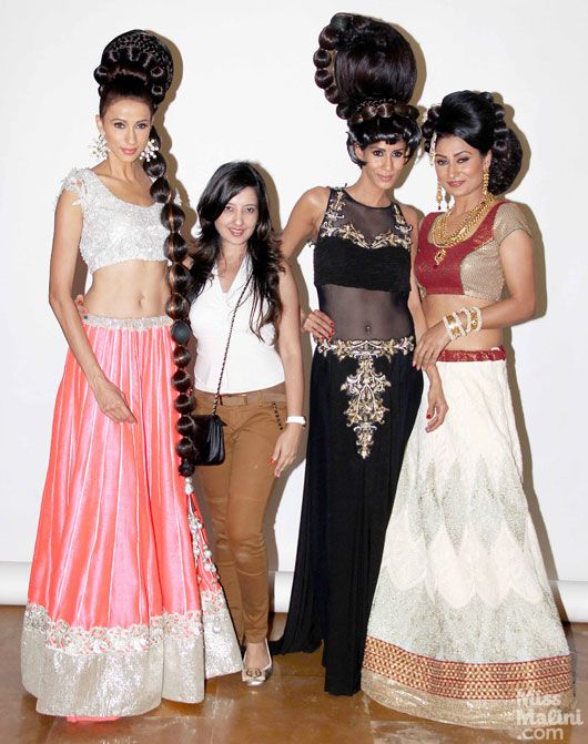Designer Amy Billimoria with her models in bridal wear