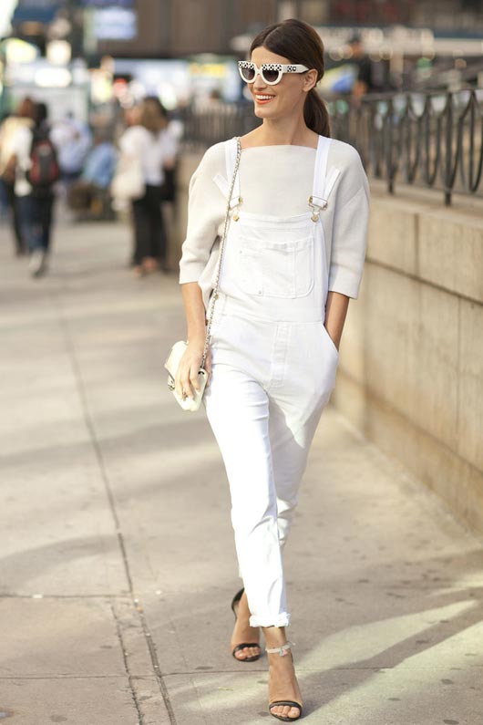 A monochromatic all over white look with a chic structured top, rolled up overalls, and embellished fashion sunglasses resemble absolute trend-setting perfection