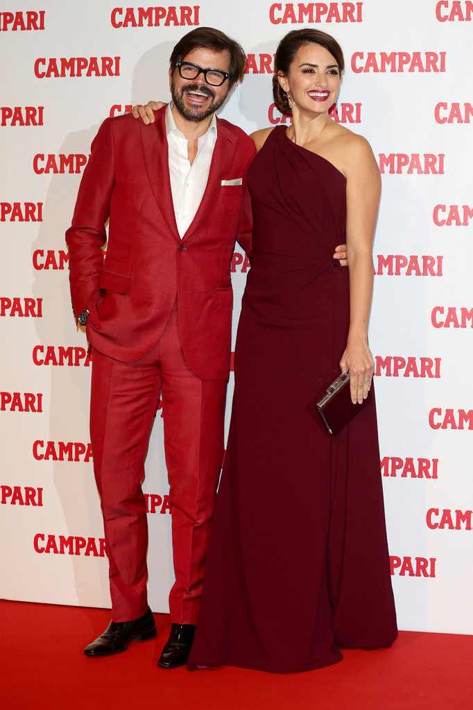 Penélope Cruz – in Armani Privé, Ferragamo shoes and Chopard jewels – with Kristian Schuller at the unveiling of the 2013 Campari calendar