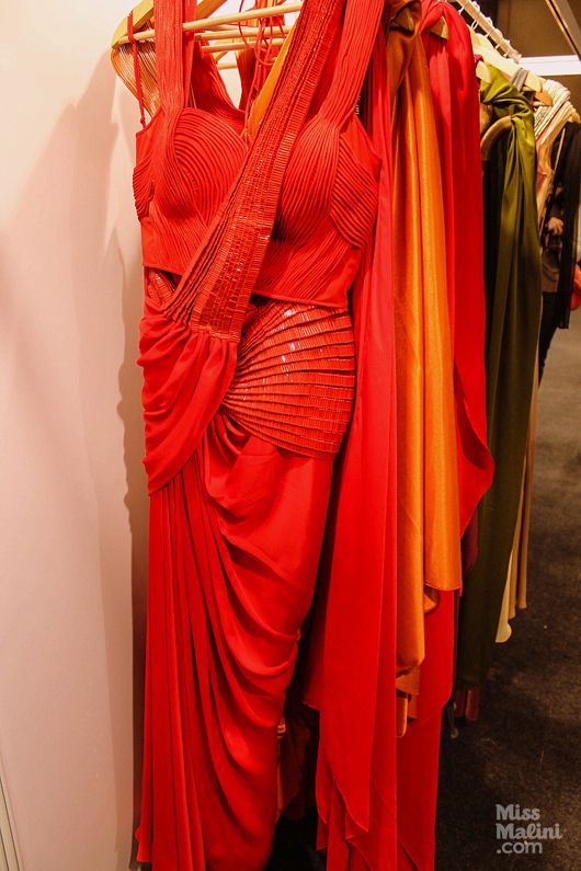 Red jersey sari by Amit Aggarwal