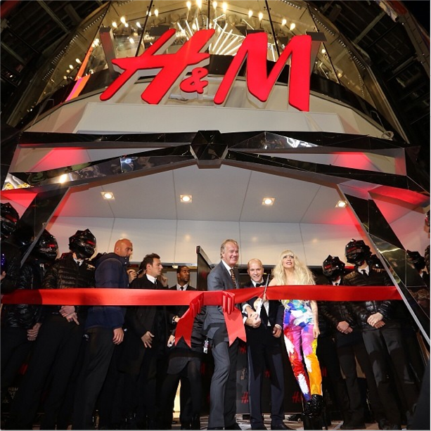 Lady Gaga cuts the red ribbon at H&M Times Square, New York