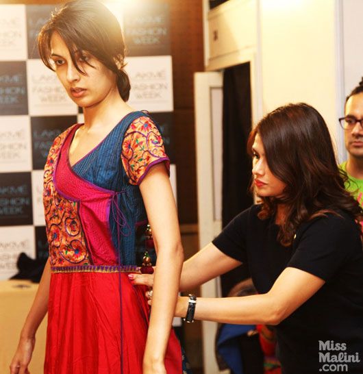 Shruti Sancheti does a fitting on model Sanea Sheikh