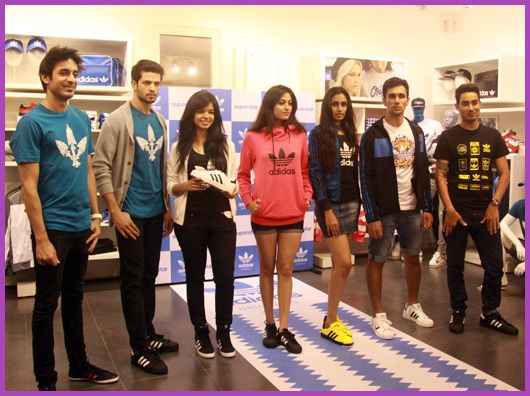 (L-R) Sahej Bakshi of Dualist Inquiry with models in adidas superstar sneakers and Nucleya