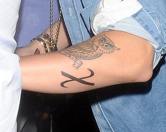 Justin Bieber's X tattoo (photo courtesy | bopandtigerbeat.com)