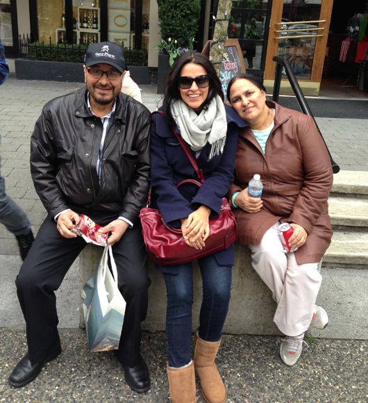 Neha Dhupia with her father and mother