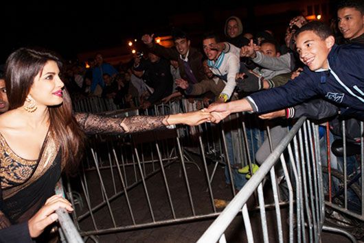 Priyanka Chopra greets a fan at the Marrakech Film Festival