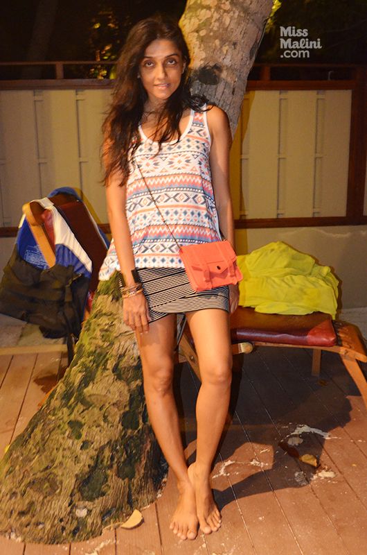 Ami Patel in a Topshop tank, BCBG wrap skirt and Proenza Schouler cross body