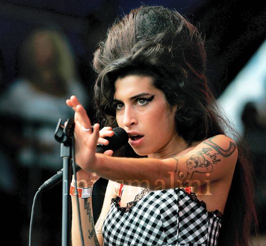 Amy's beehive hairdo was legendary