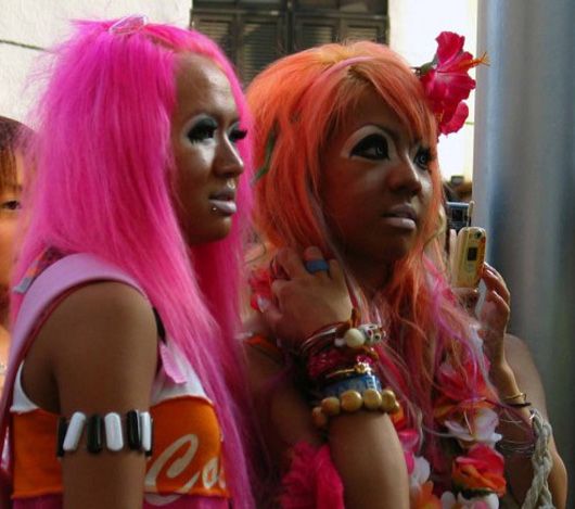 Over-the-top makeup, fake tan, bright accesories and outlandish wigs are the style essentials for a Ganguro girl