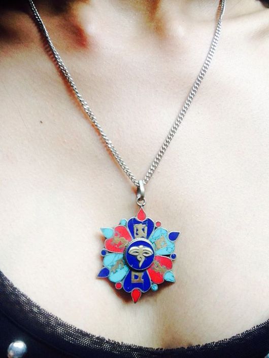 Erika found this colourful pendant  on the street!