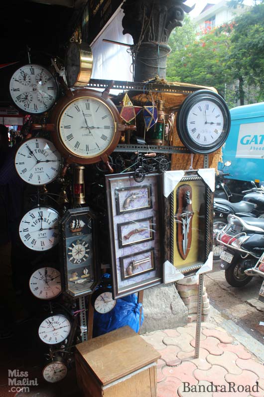 Antiques on display at a street stall on Colaba Causeway.